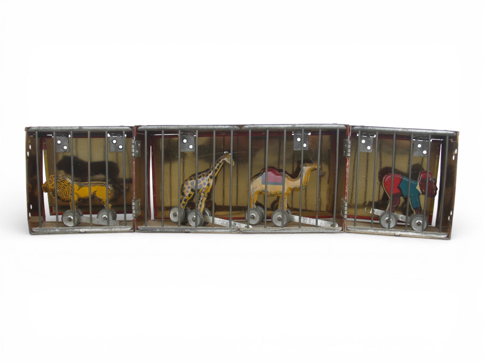 Tin Litho Lindstrom Circus Cage: Original tin litho Lindstrom circus cage with animals. Fold out cage includes 4 animals on wheels. When opened, approx. 14" long. Shows playwear with scuffs, scratches, etc. Nice circus graphics