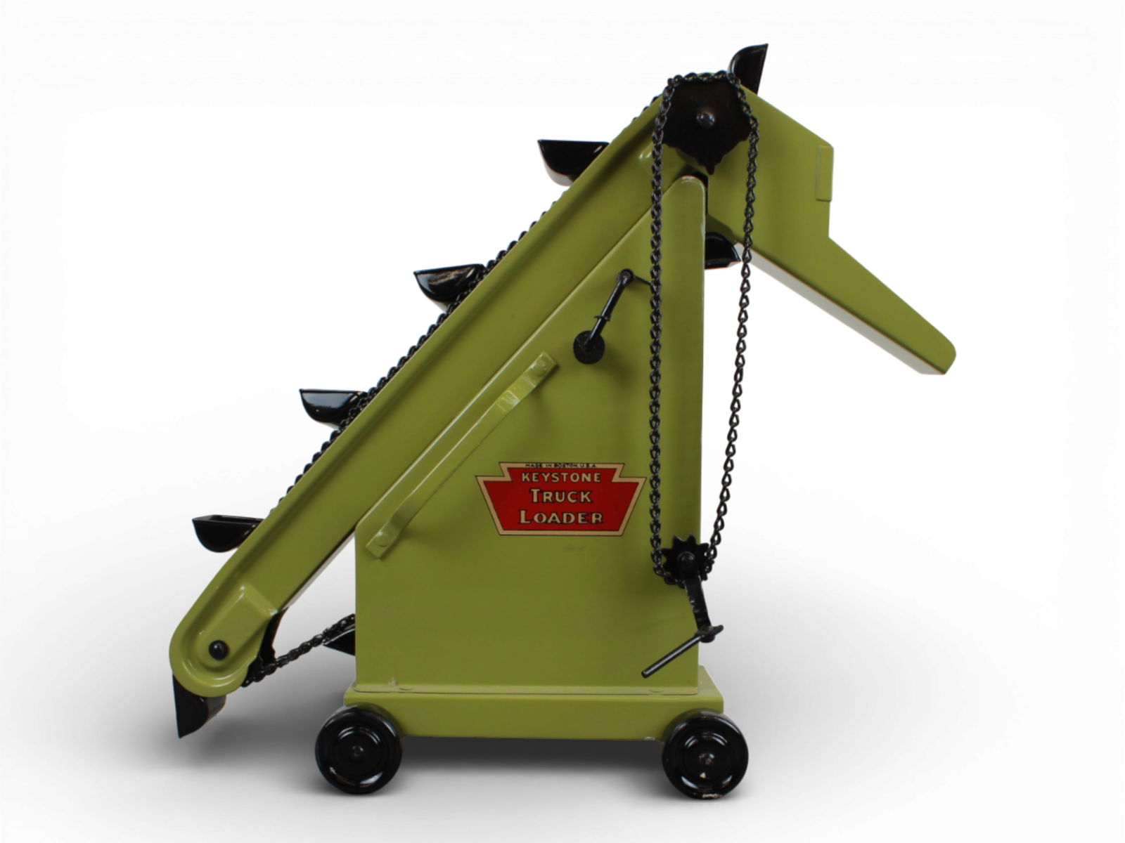 Restored Keystone Truck Loader: Painted pressed steel, 19" tall. Pro Job, restored to like new.From the Gary Slutzky Collection of Pressed Steel, Tin, and Cast Iron Vehicles. Shipping: Weiss Auctions offers full-service, in-house