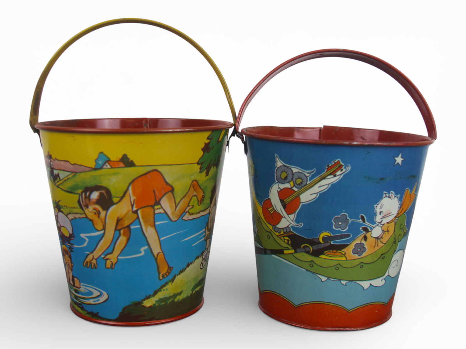 (2) Tin Litho Children's Sand Pails: US Metal Toy Co, and Ohio Art. Each depicts colorful playful graphics throughout. Each approx. 5" tall. Each shows surface wear with scuffs and scratches. Shipping: Weiss Auctions offers