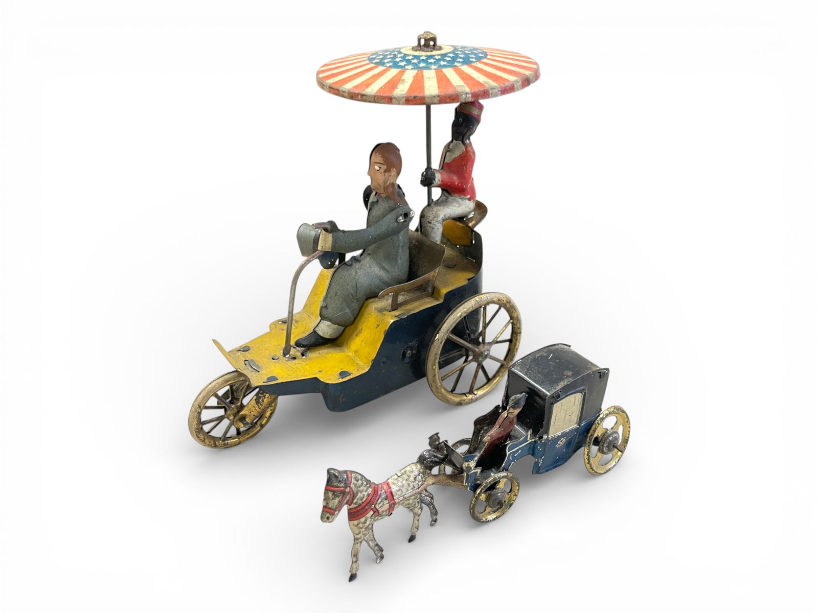 (2) Early German Tin Toys: Includes a Lehmann New Century Cycle, working; Mier HD Carriage Penny Toy. They show light to moderate wear. Shipping: Weiss Auctions offers full-service, in-house shipping for nearly all items in