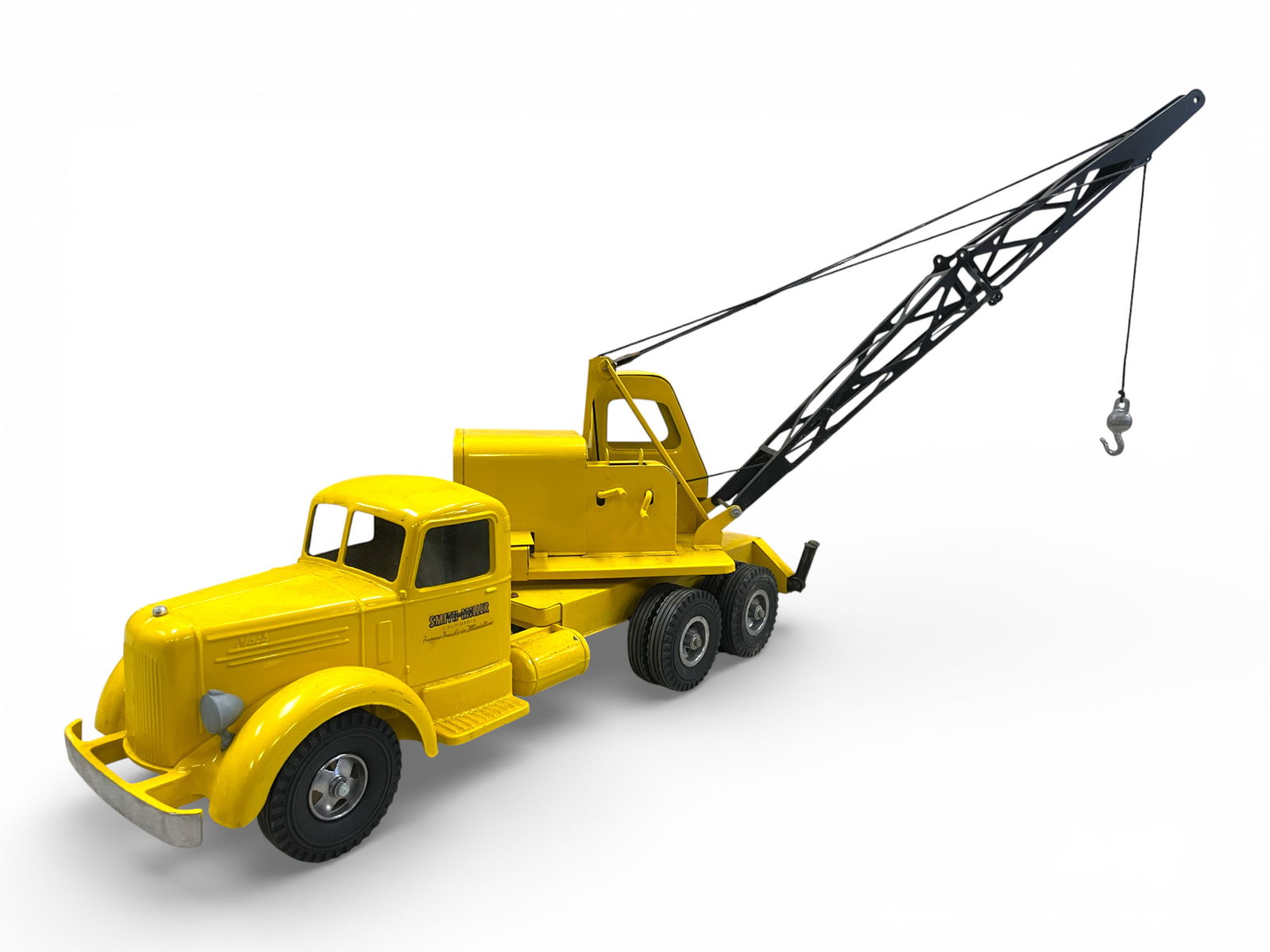 Custom Smith-Miller Mobile Crane: Nice Smitty Mack die cast chassis and cab, with Ny-Lint Unit Crane mounted on back, missing top of boom pulley. Shipping: Weiss Auctions offers full-service, in-house shipping for nearly all items