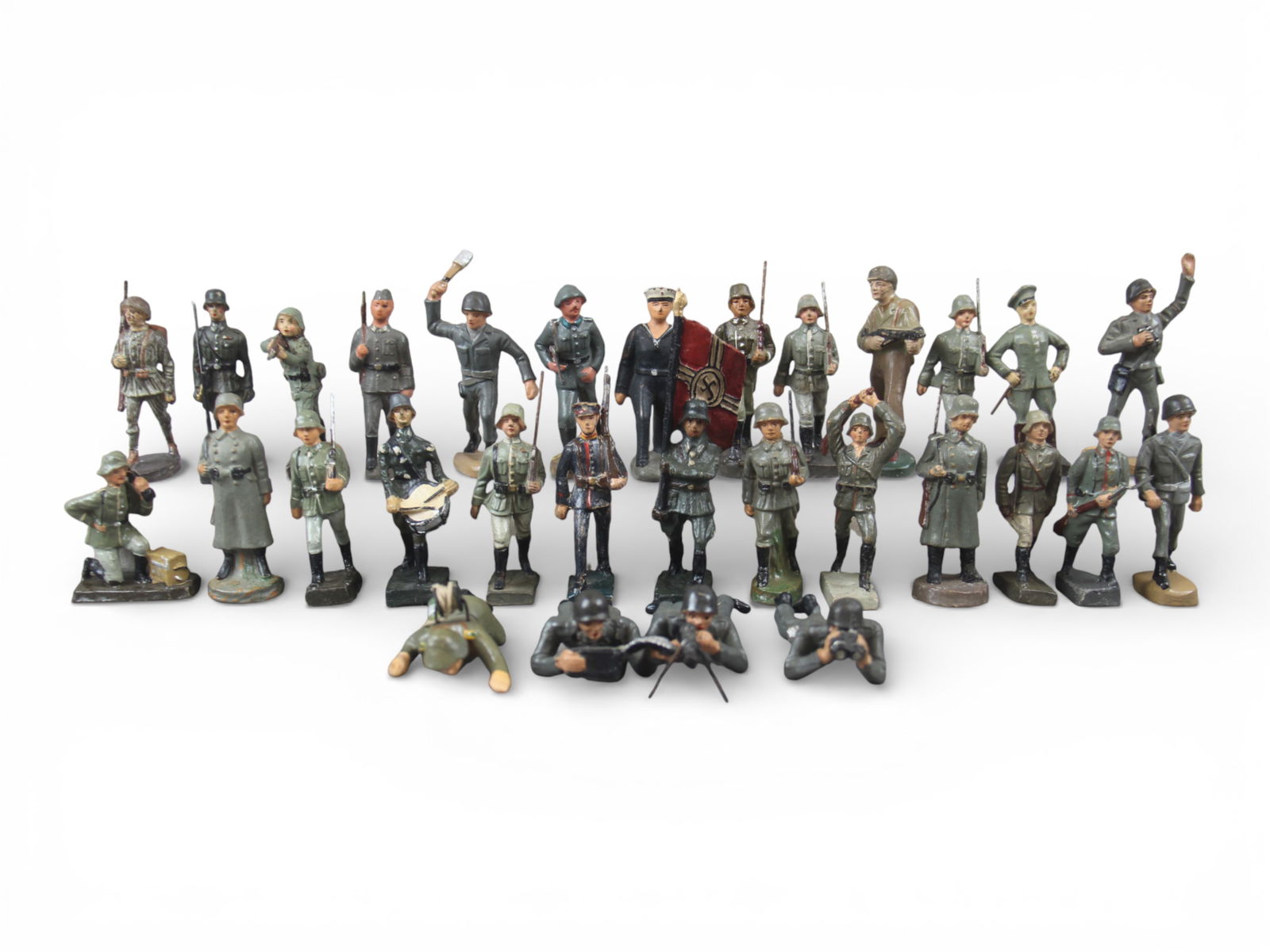 Composition Toy Soldiers: 30 Composition toy soldiers, various makers including Lineol, Leyla, Durso, NB, and others. Some wear. Shipping: Weiss Auctions offers full-service, in-house shipping for nearly all items in this