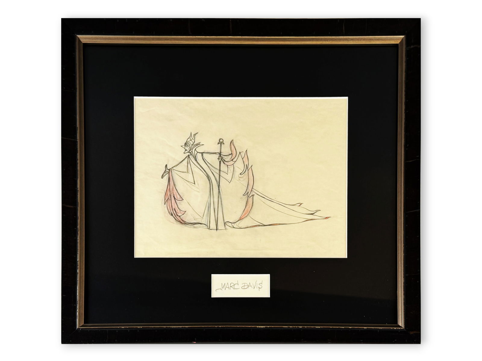 Maleficent Animation Drawing Signed Marc Davis: Original animation drawing of Maleficent from Walt Disney's "Sleeping Beauty," along with cut signature of Marc Davis below. Pencil drawing with light colored pencil accents on paper, showing