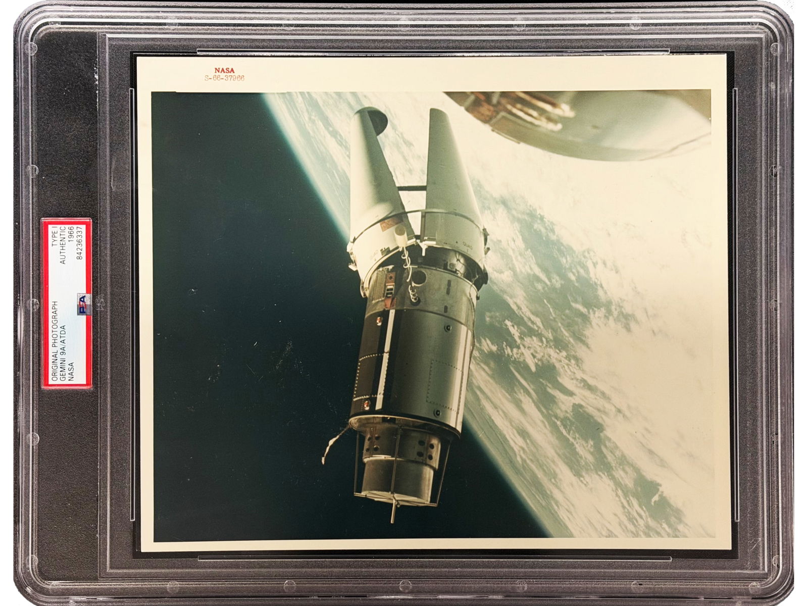 Gemini 9A ATDA Photo - Type I: Original NASA-issued Type I photograph of the Augmented Target Docking Adapter (ATDA) as seen from Gemini 9A, 1966. The malfunctioning target was famously described by the crew as the "Angry