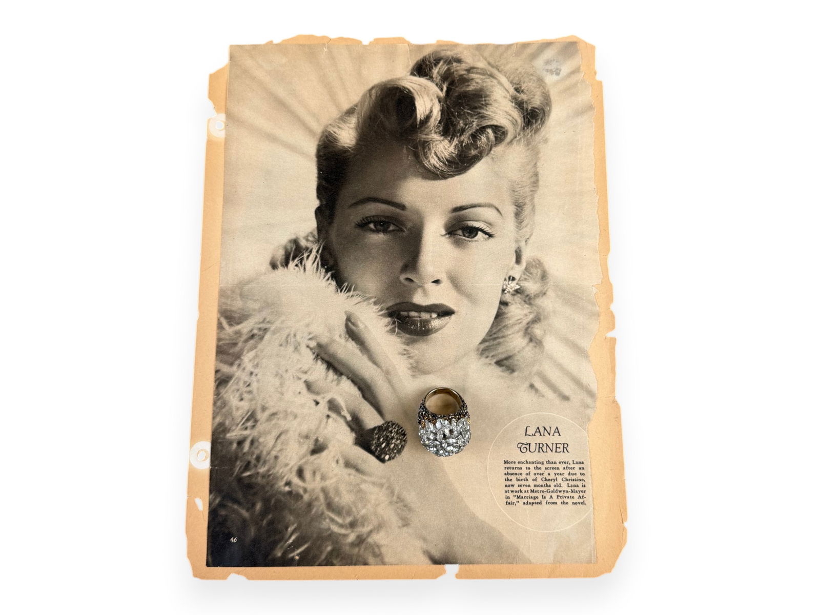 Lana Turners Worn Bubble Ring: Circa 1940s bubble cocktail ring in sterling silver with yellow gold electroplating, set with foil-back crystals, owned and worn by Lana Turner. The lot includes a full-page black-and-white magazine