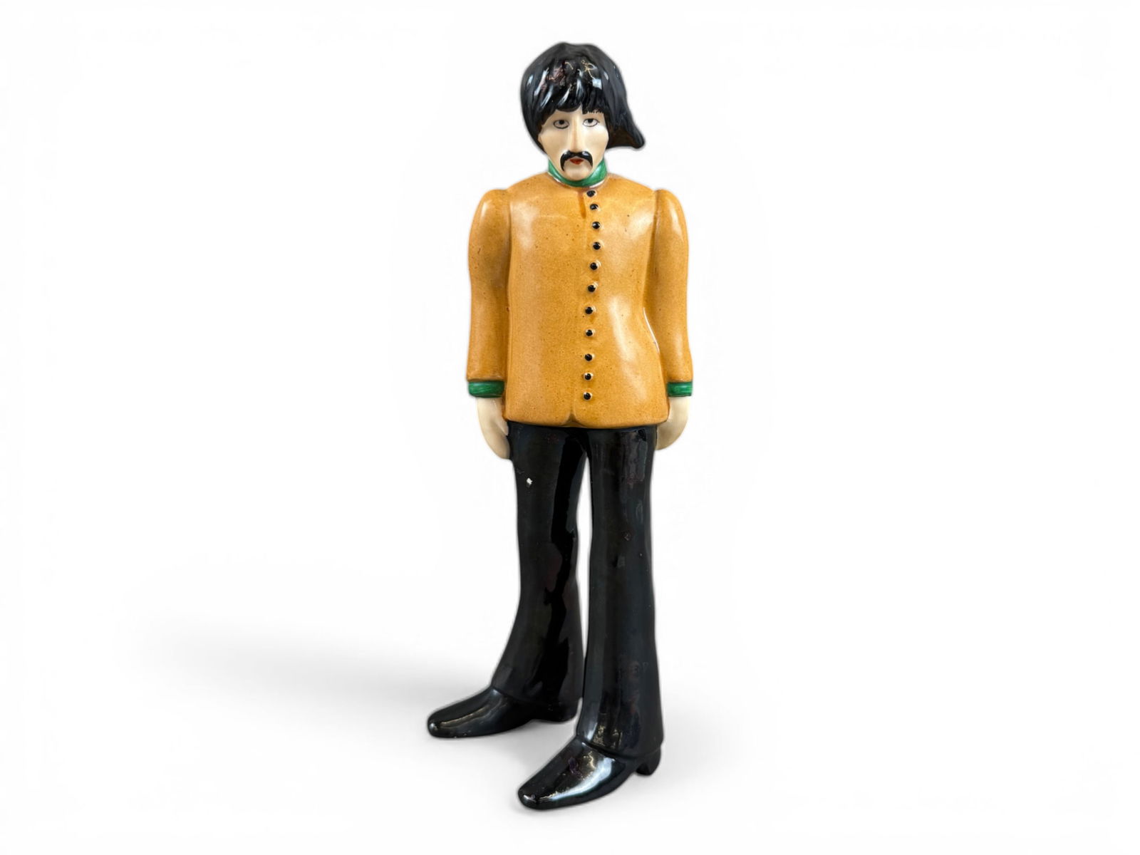 1968 Goebel Beatles George Harrison Figurine: Original 1968 The Beatles Yellow Submarine George Harrison porcelain figurine produced by Goebel. Hand-painted and standing approximately 8.5" tall, the figure was manufactured in West Germany for