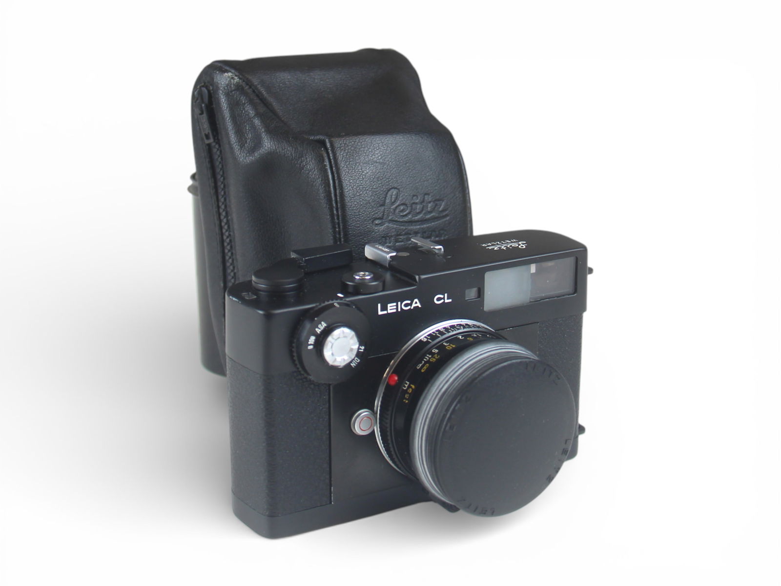 Leica CL Camera With Summicron-C Lens: Leica CL camera with Summicron-C 2/40 lens. Camera serial number 1807409. Lens serial number 2551898. With case and manual. From single owner, lifetime Leica and photographica collection. Shipping: We