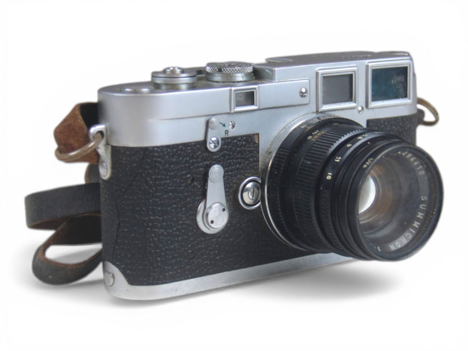 Leica M3 Camera & Summicron 2/40 Lens: Leica M3 Camera, serial number 737445, with Summicron 1:2.50 lens, serial number 2294410.Shipping: Weiss Auctions offers full-service, in-house shipping for nearly all items in this auction. For a