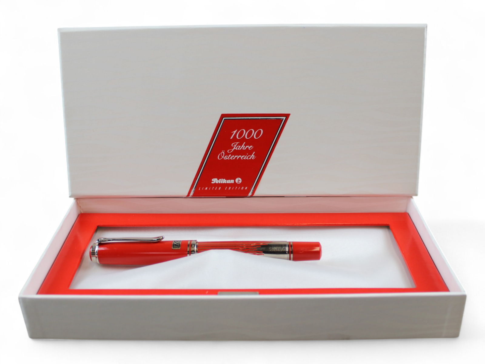 Pelikan 1000 Jahre Osterreich Ltd Ed Fountain Pen: Pelikan 1000 Jahre Osterreich (1000 Years of Austria) Limited Edition Fountain Pen #326/1000 in original box. Minor wear, if any.Shipping: Weiss Auctions offers full-service, in-house shipping for