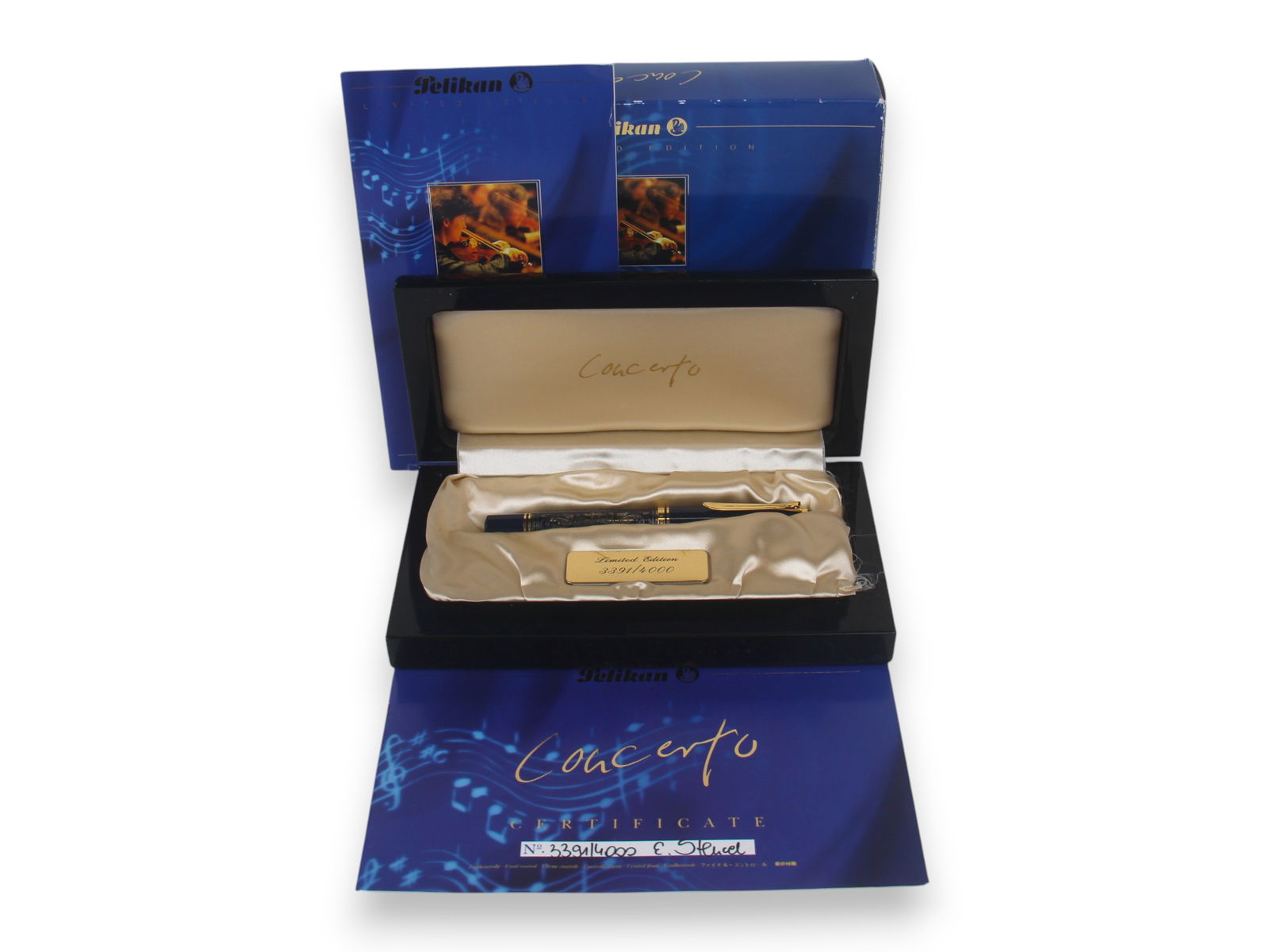 Pelikan Concerto Ltd Ed Fountain Pen: Pelikan Concerto limited edition fountain pen #3391 of 4000 in original box. 18k gold nib and sterling silver overlay. Minor wear, if any.Shipping: Weiss Auctions offers full-service, in-house