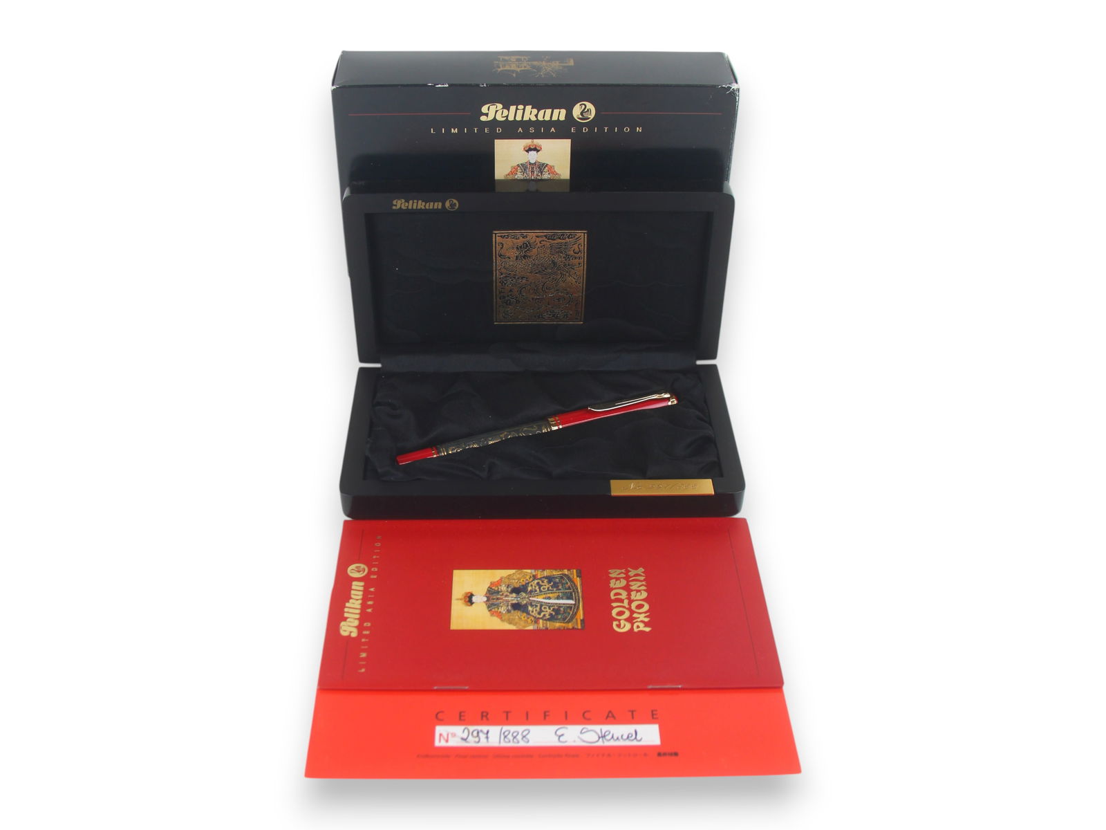 Pelikan Golden Phoenix Ltd Ed Fountain Pen: Pelikan Golden Phoenix Limited Edition Fountain Pen #297/888 in original box.. Minor wear, if any. Shipping: Weiss Auctions offers full-service, in-house shipping for nearly all items in this auction.