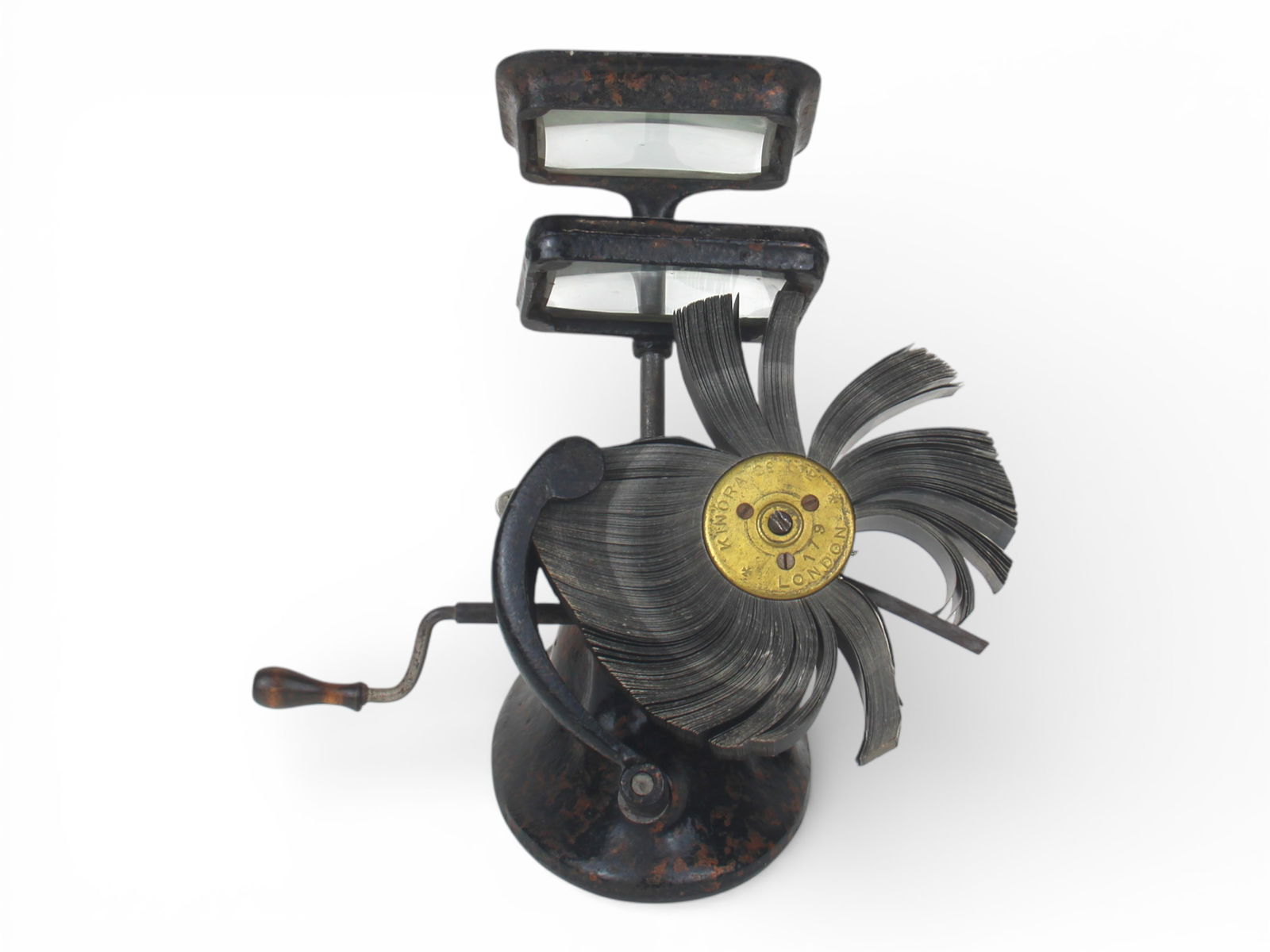 Cast Iron Kinora Picture Viewer with Dual Lens: Circa 1912. Cast Iron "Kinora" Picture Viewer Machine with Dual Lens. Stippled black and copper paint to main body and lens. Marked "The Kinora" registered trade mark and "Patents Applied For" in