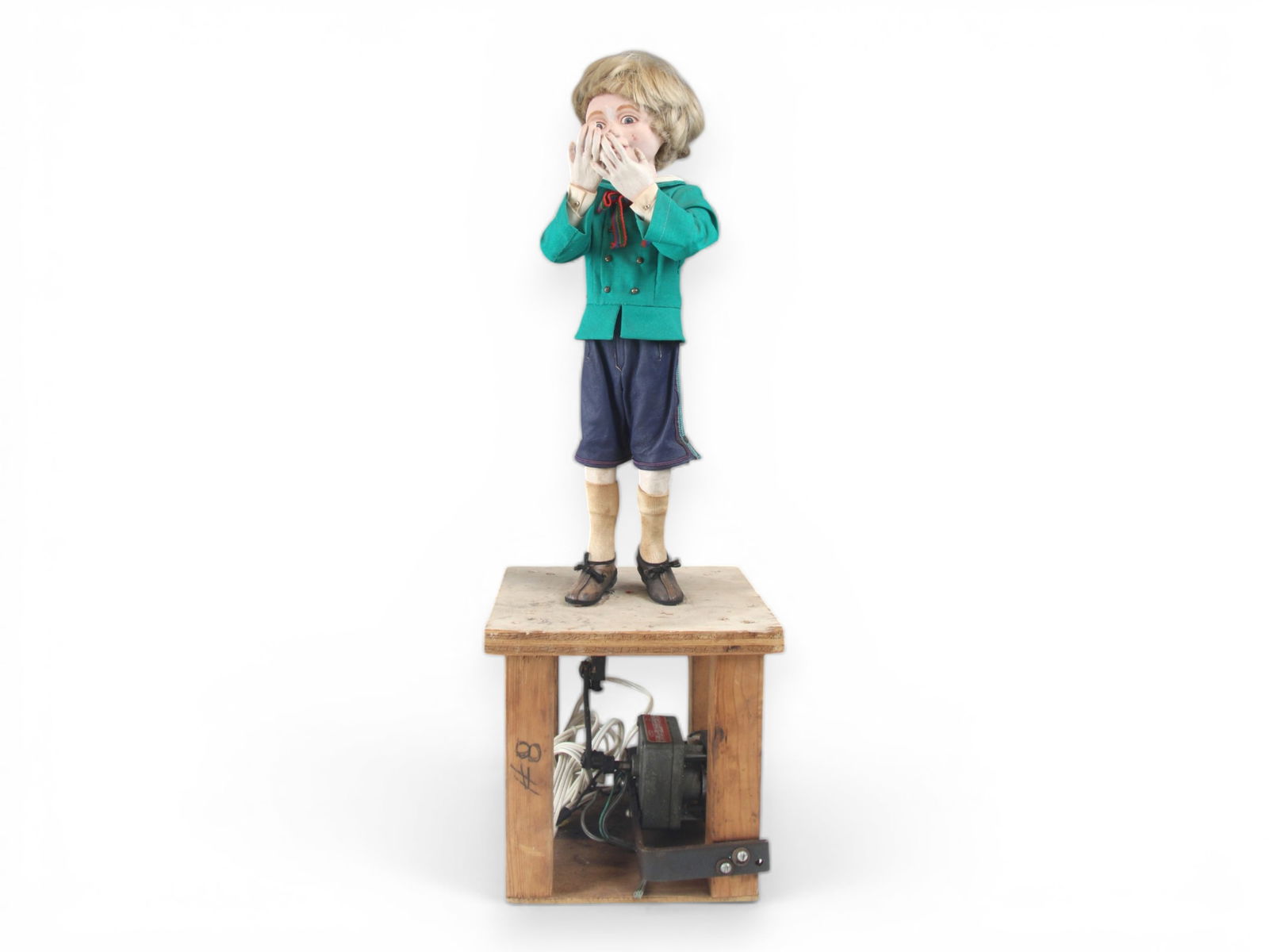 Macy's Dept Store Christmas Window Automaton: Christmas window display automaton from the Macy's Chicago store, depicting a young boy eating cherry pie. The figure is dressed in period style clothing including a green double-breasted jacket,