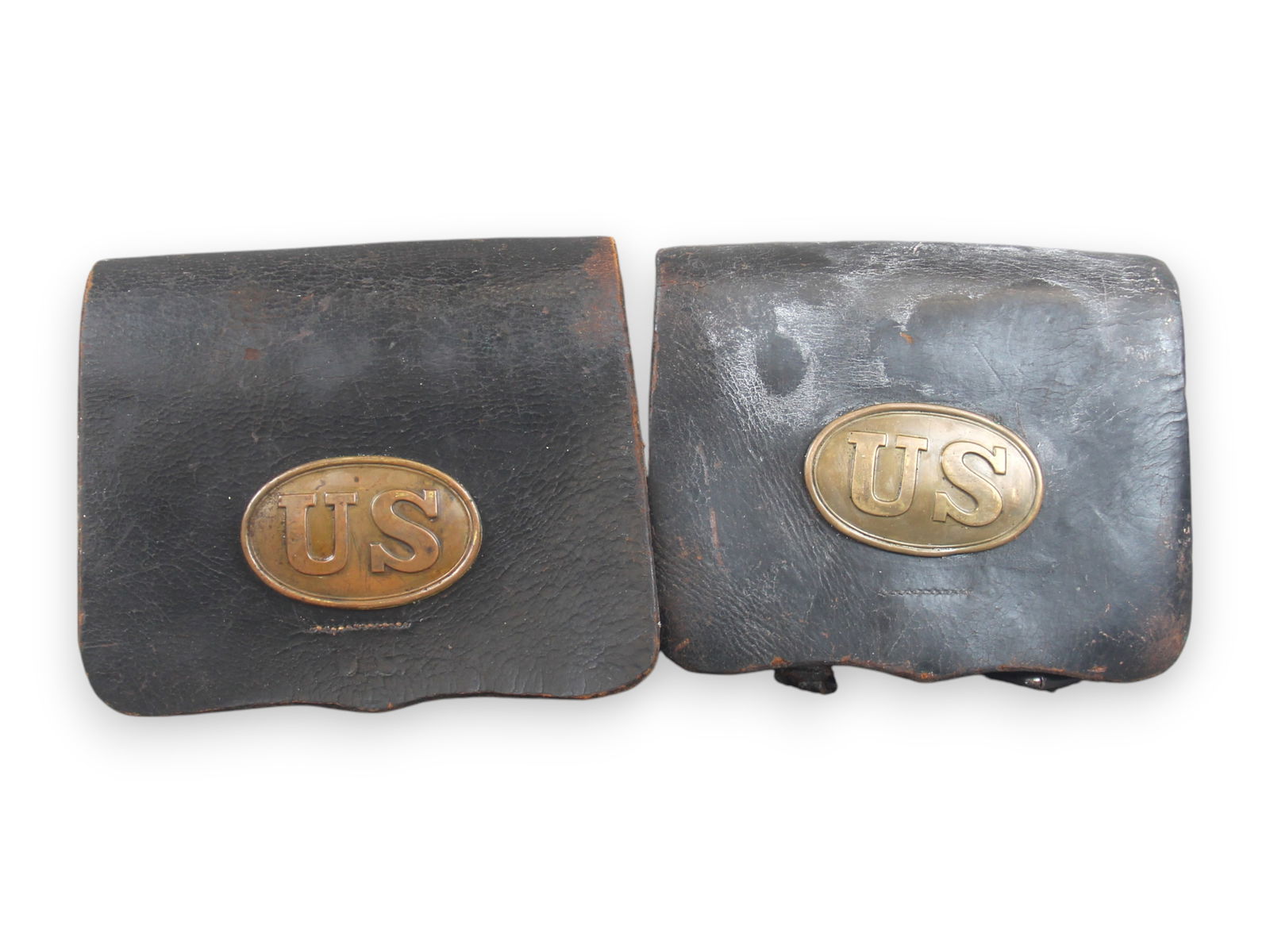 (2) U.S. 1855 Cartridge Boxes: 2 US Model 1855 Cartridge Boxes. Some wear.Shipping: Weiss Auctions offers full-service, in-house shipping for nearly all items in this auction. For a shipping quote, please contact us prior to the