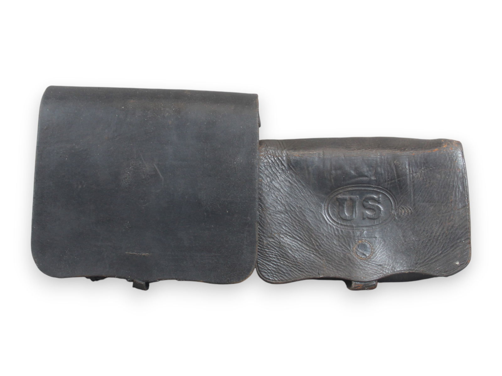 (2) U.S. Cartridge Boxes: 2 US Cartridge Boxes, one Model 1857, another from same period. Some wear.Shipping: Weiss Auctions offers full-service, in-house shipping for nearly all items in this auction. For a shipping quote,