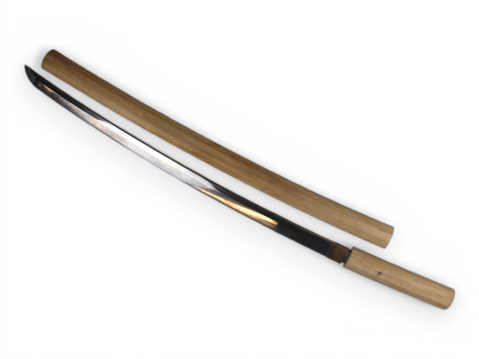 Signed Japanese Sword Sukesada Osafune Bizen: Japanese sword signed on tang. Signature appears to be Bizen no Kuni ju Osafune Sukesada (made by Sukesada in Osafune in Bizen Province). Signature appears hand carved. Wavy hamon on blade. In