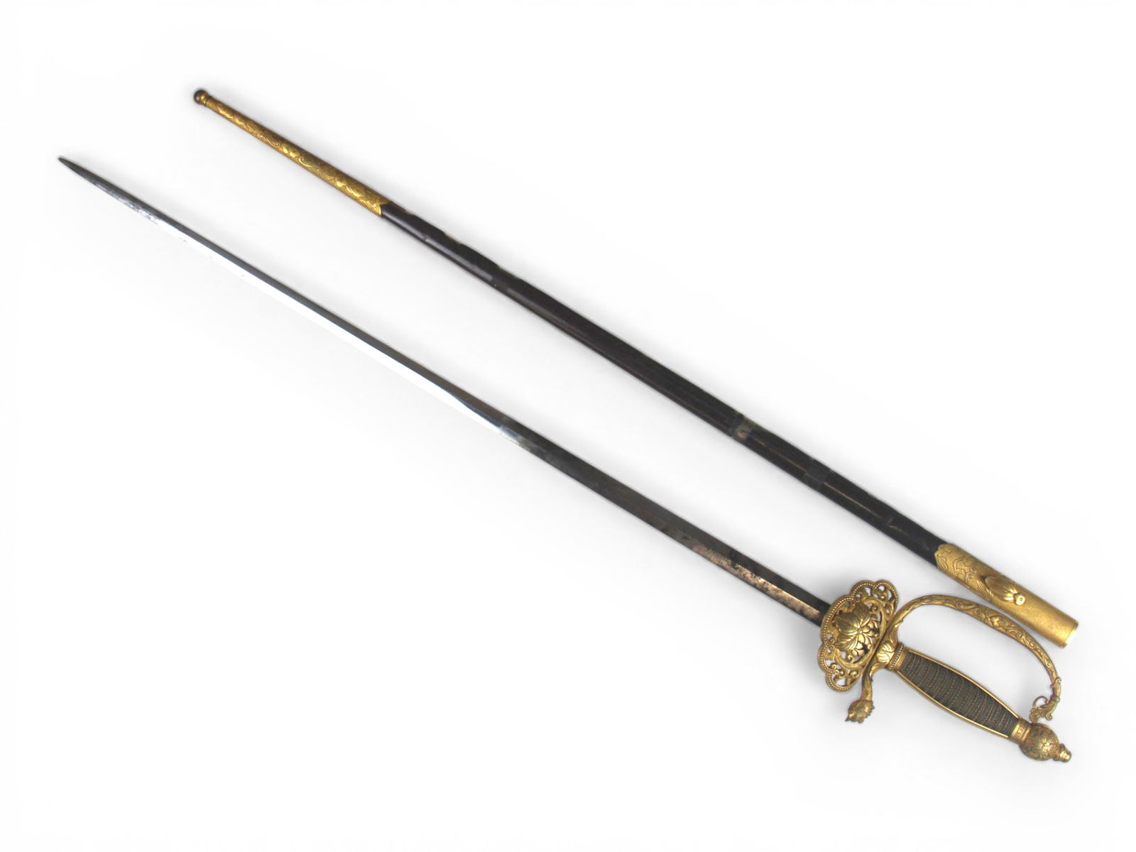 Japanese Type 19 Civilian Official Dress Sword: Japanese Meiji Type 19 Civilian Official Sonin-kan Western Style Dress Sword (with 3-5-3 bud pattern). Approx. 33 1/2'' total length. Nice example of an uncommon sword.Shipping: Weiss Auctions offers