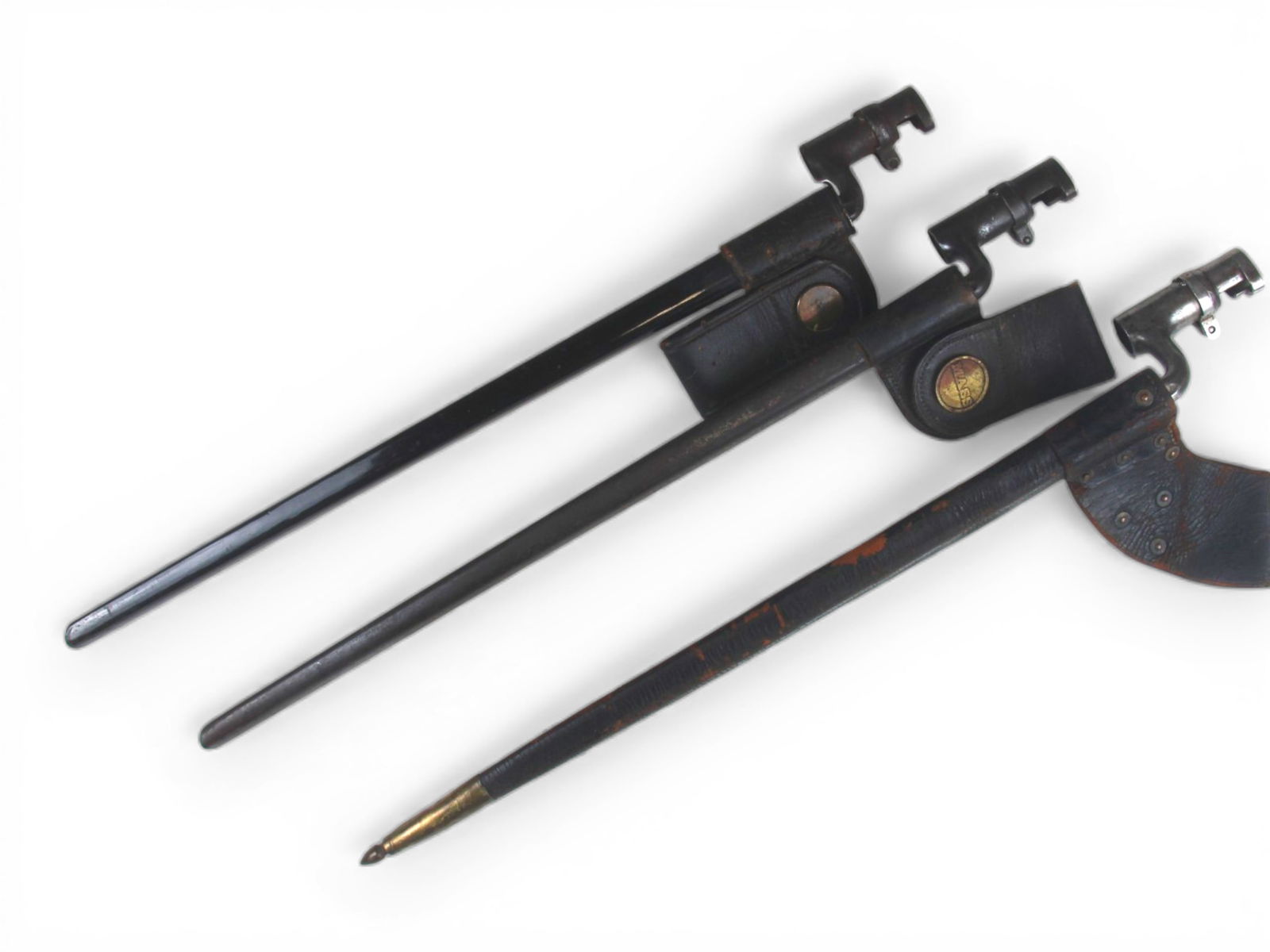 (3) U.S. Socket Bayonets: 3 U.S. Socket bayonets with scabbards. Each approx. 22'' long.Shipping: Weiss Auctions offers full-service, in-house shipping for nearly all items in this auction. For a shipping quote, please