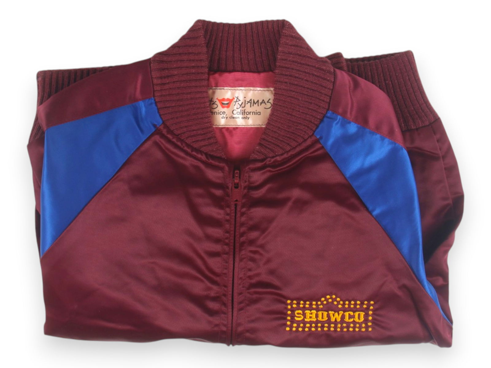 Van Halen 1980 Satin World Tour Jacket, ShowCo: Van Halen 1980 Satin World Tour Jacket, maroon with blue stripes down sleeves, production company "ShowCo" logo embroidered on front, "Van Halen (logo) World Tour" embroidered on back, label lists "Ca