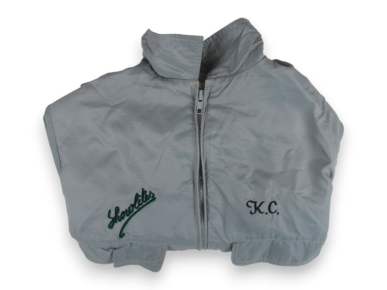 Van Halen 1981 Tour Jacket: Van Halen 1981 Gray Jacket, "Van Halen" logo embroidered on back, "K.C." and "ShowLites" embroidered on front, label lists "Cats Pajamas, Venice, California", size S, from tour assistant Karen Cohen c