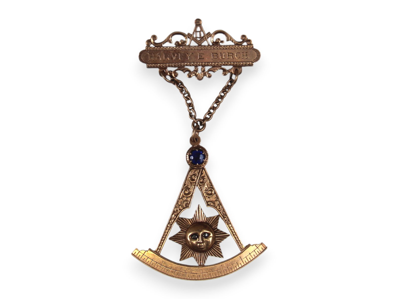 Gold Masonic Badge: Gold Masonic Badge, engraved on hanger Harvey E. Burch and onrear "Presented to Harvey E. Burch by Members of Mystic Carole Lodge No. 109 AF & AM May 15 1905.".Tested to approx. 10k. Approx. 4'' x