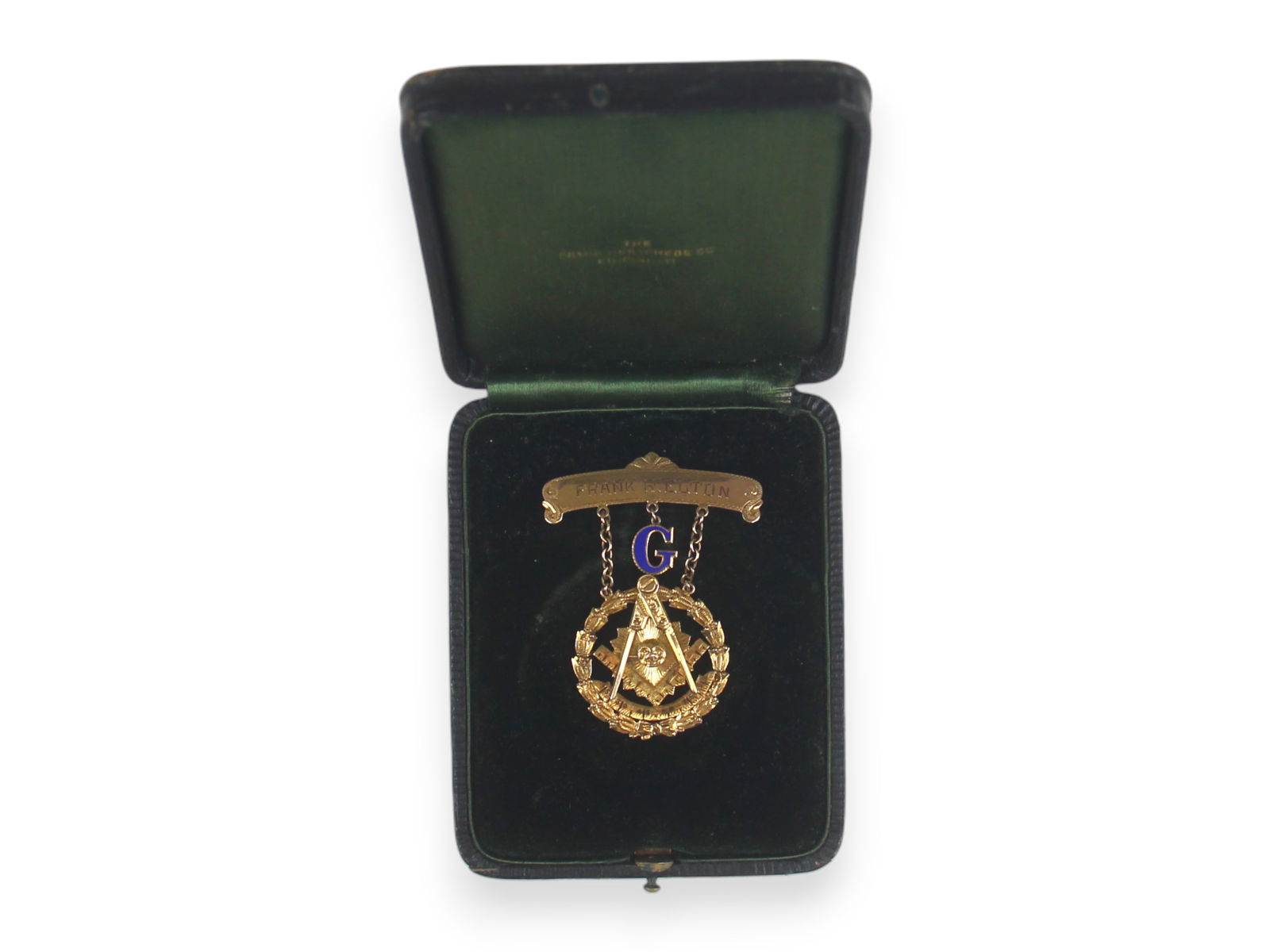 Gold Masonic Badge: Gold Masonic Badge engraved to Frank R. Elton. In original box.. Tested to approx. 10k. Approx. 1' 5/8' x 2 1/8''.Shipping: Weiss Auctions offers full-service, in-house shipping for nearly all items