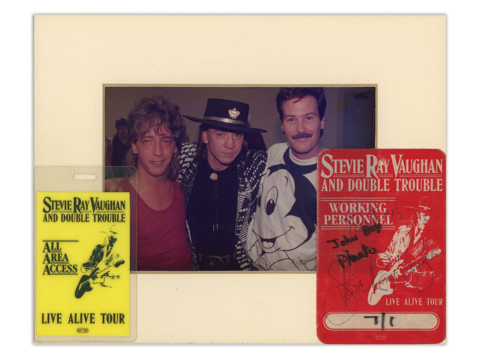 Stevie Ray Vaughan Signed Backstage Pass: Stevie Ray Vaughan Signed Backstage Pass, July 1, 1987, signed at Great Woods in Mansfield MA, also includes matted photo of John-Boy with Stevie Ray Vaughan and a laminated Tour Pass, from the