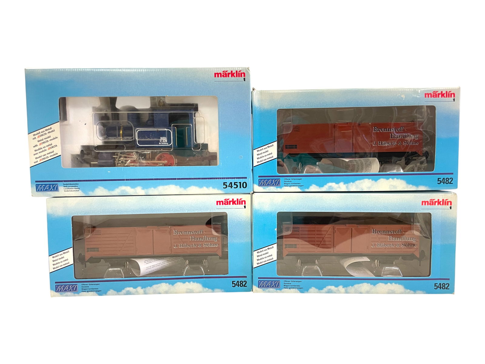 4pc Marklin Maxi Ballast Train Set: 1/G Gauge. Enamel Painted Pressed Steel. includes a 54510 Steam Tank Loco with 3 - 5482 Brennstoff Gate Side open ballast wagons. All show light use with boxes.Shipping: Weiss Auctions offers