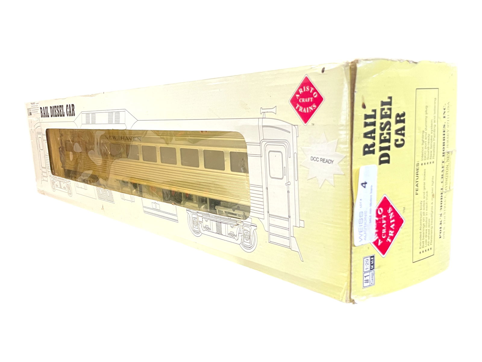 Boxed Aristo Craft 22809 NH Budd Diesel: 1/G Gauge. Nice Powered NH Budd Car with smoke and directional lighting & interior lights. Sound & DCC Ready. It shows light use with faded box.Shipping: Weiss Auctions offers full-service, in-house