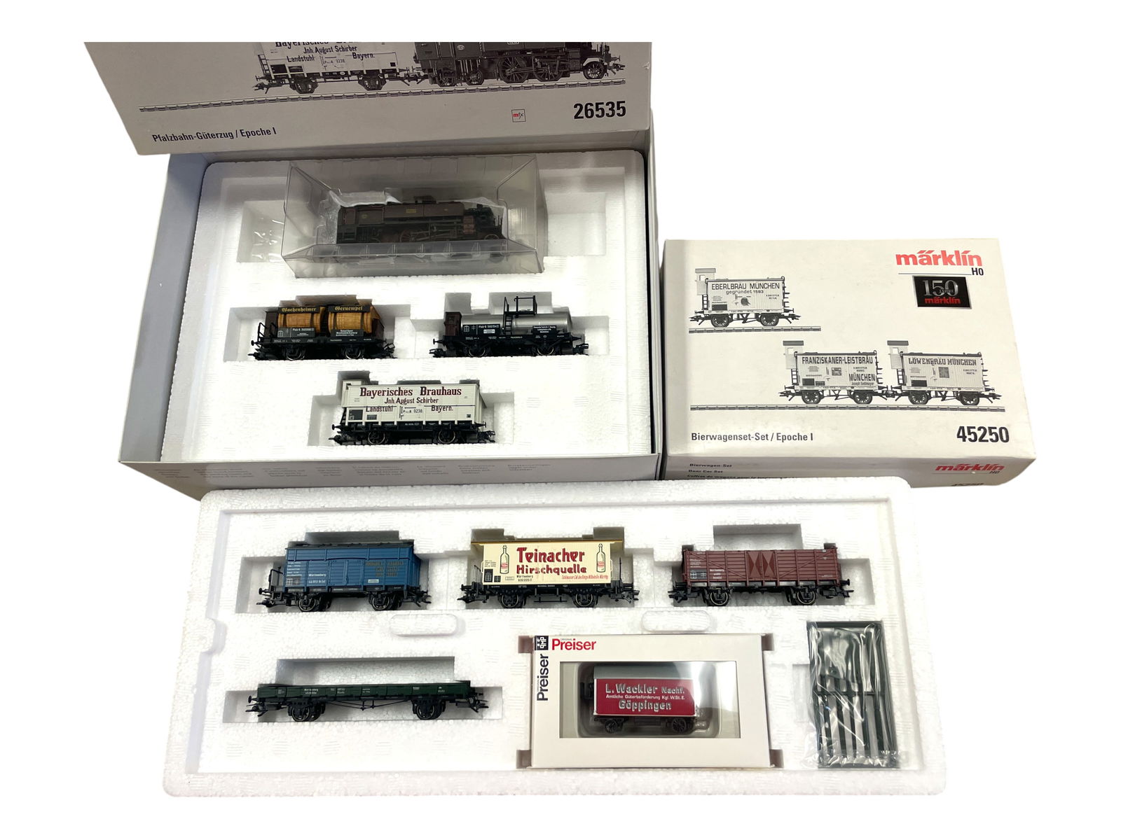 Extended Marklin HO Palatine RRY Train: HO Gauge. Includes set 26535 with a DXII Sand 2-4-4T Steam Tank loco with Mfx Control. 3 Goods wagons; 45250 3pck Beer Wagons; 48808 4pc old Timer Set. All show light use with boxes.Shipping: Weiss