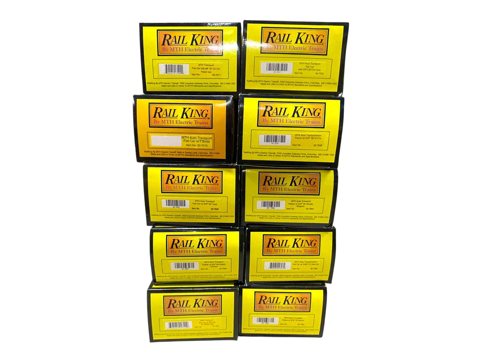 10 MTH Freights with Die Cast Vehicles: Includes 30-7681; 30-7660; 30-7825; 30-7613; 30-7671; 30-7323; 30-7639; 30-7662; 30-7693; 30-7661. Most appear new in boxes; Shipping: Weiss Auctions offers full-service, in-house shipping for nearly