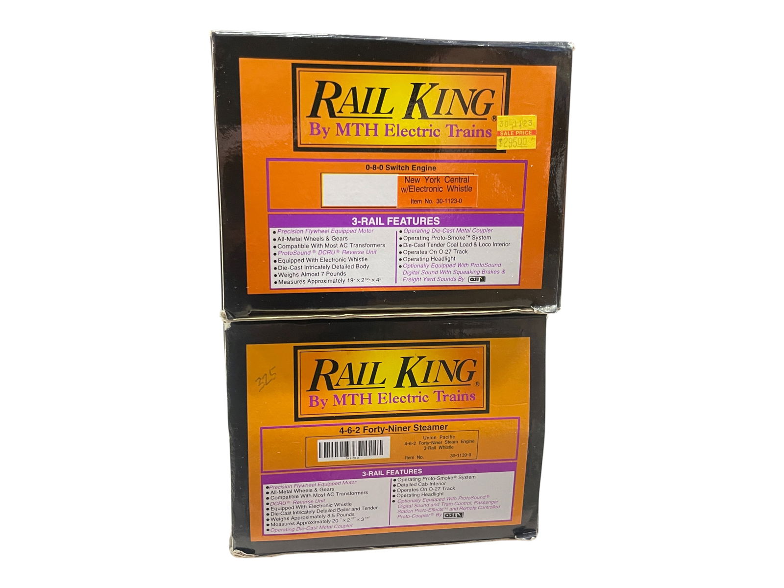 2 MTH RailKing Steam Locos: Includes a 30-1139-0 UP 49'r with whistle; 30-1123-0 NYC 0-8-0 steam switcher with whistle. They show light use with boxes. Shipping: Weiss Auctions offers full-service, in-house shipping for nearly a