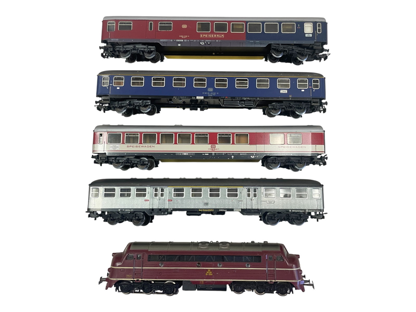 5pc Vintage Marklin HO Danish Express Set: HO Gauge. includes a 3067 DSB Class My Diesel, die cast body with 4078 Buffet; 4043 Coach; 4054 Speiswagon with interior; 4027 1st class Coach with interior. All show light to moderate play wear. Ship