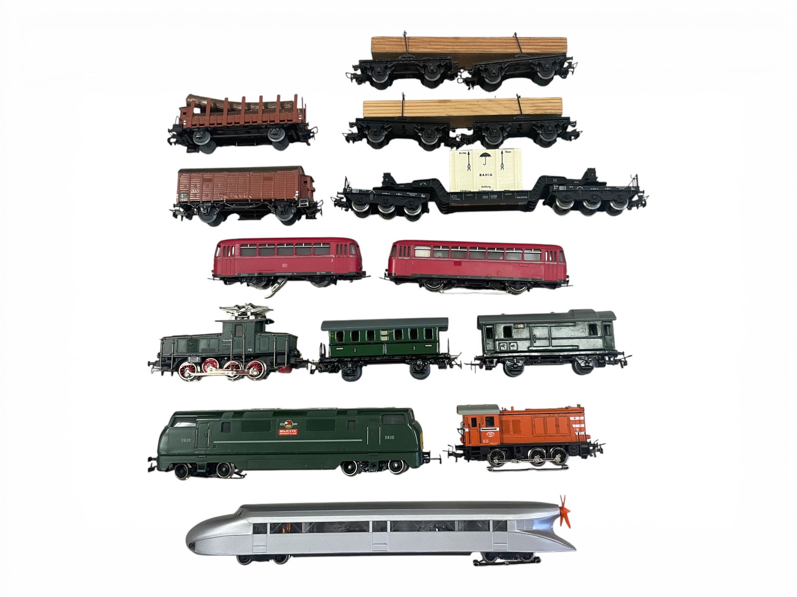 13pc Vintage Marklin HO Trains Lot: HO Gauge. Includes a CE800 E63.02 Electric, plastic body; 3138 Swedish V36 Diesel; 3073 D830 Majestic Warship Electric; 3016/4018 DB800 K+B Mac Railbus & Trailer; 3077 Rail Zeppelin; 1955 #327 & 328 P