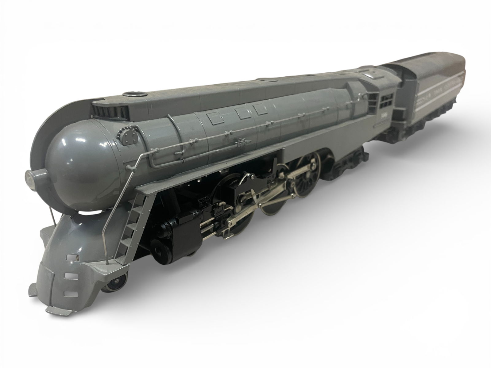 Williams Brass O Gauge 20th Century Ltd: Nice factory painted brass Dreyfuss Hudson, 3-rail streamline loco with light whistle and bell. It shows light run time. NO box. ? From The Estate Collection of Joel CaneShipping: Weiss Auctions