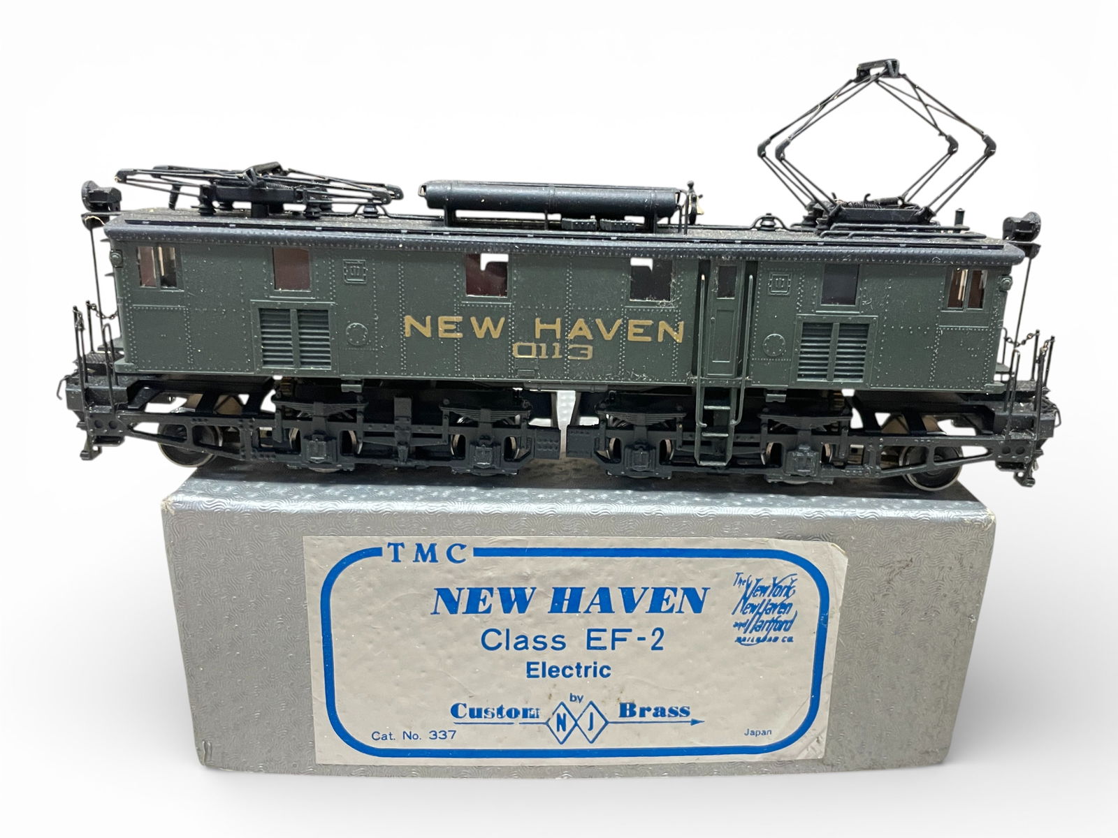 NJ Custom Brass HO NH EF2 Electric: HO Gauge. Nice Factory painted brass 2-B-B-2 #0113. Has open frame motor with windows added. It shows light use with box, no foam.Shipping: Weiss Auctions offers full-service, in-house shipping for