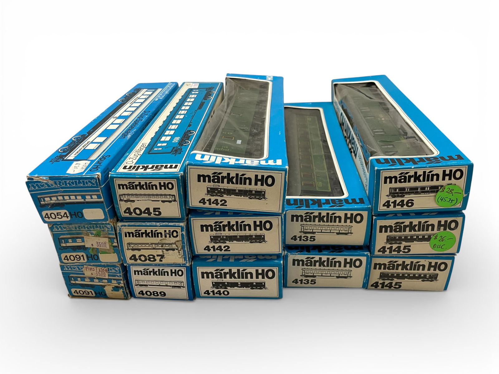14 Assorted Marklin HO Passenger Cars: HO Gauge. Includes 4054, 2-4091; 4045, 4087, 4089. 4140, 2-4142; 2-4135; 2-4145; 4146. All show light use with shop worn boxes.Shipping: Weiss Auctions offers full-service, in-house shipping for