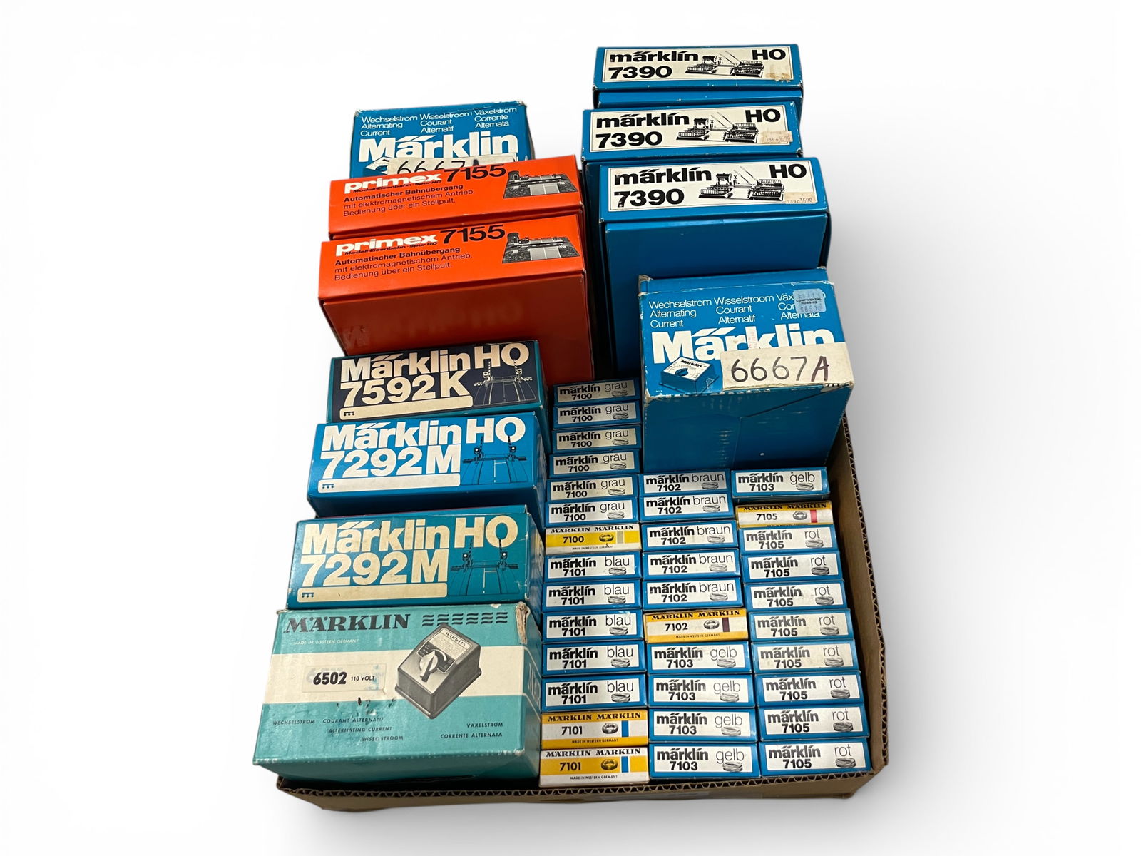 45pc Boxed Marklin HO Accessories Lot: HO Gauge. Includes Grade Crossings 2-7155; 3-7390; 2-7292M; 7592K; Transformers- 6502, 2-6667A; Assorted 7100 series wire. All have boxes, some show light use. Examine photos for exact lot contents. S