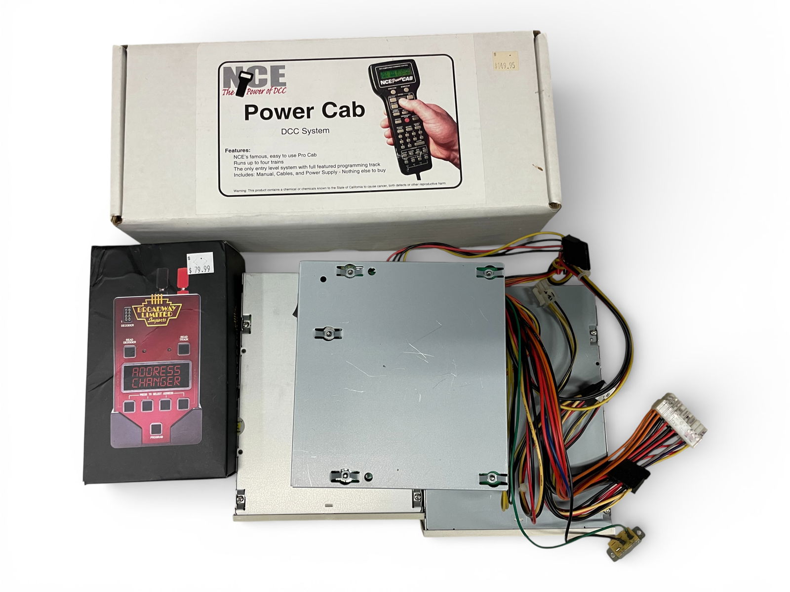 HO Trains Controllers & Computers: HO Gauge. Includes a Broadway Limited 1020 Address Challenger, ob; NCE 525025 Power Cab DCC System, ob; AOpen 65X Model MTRPCD-956E/AKH; LPK230 500W transformer; Shuttle Inc 50Xmax CD-Rom Drive,