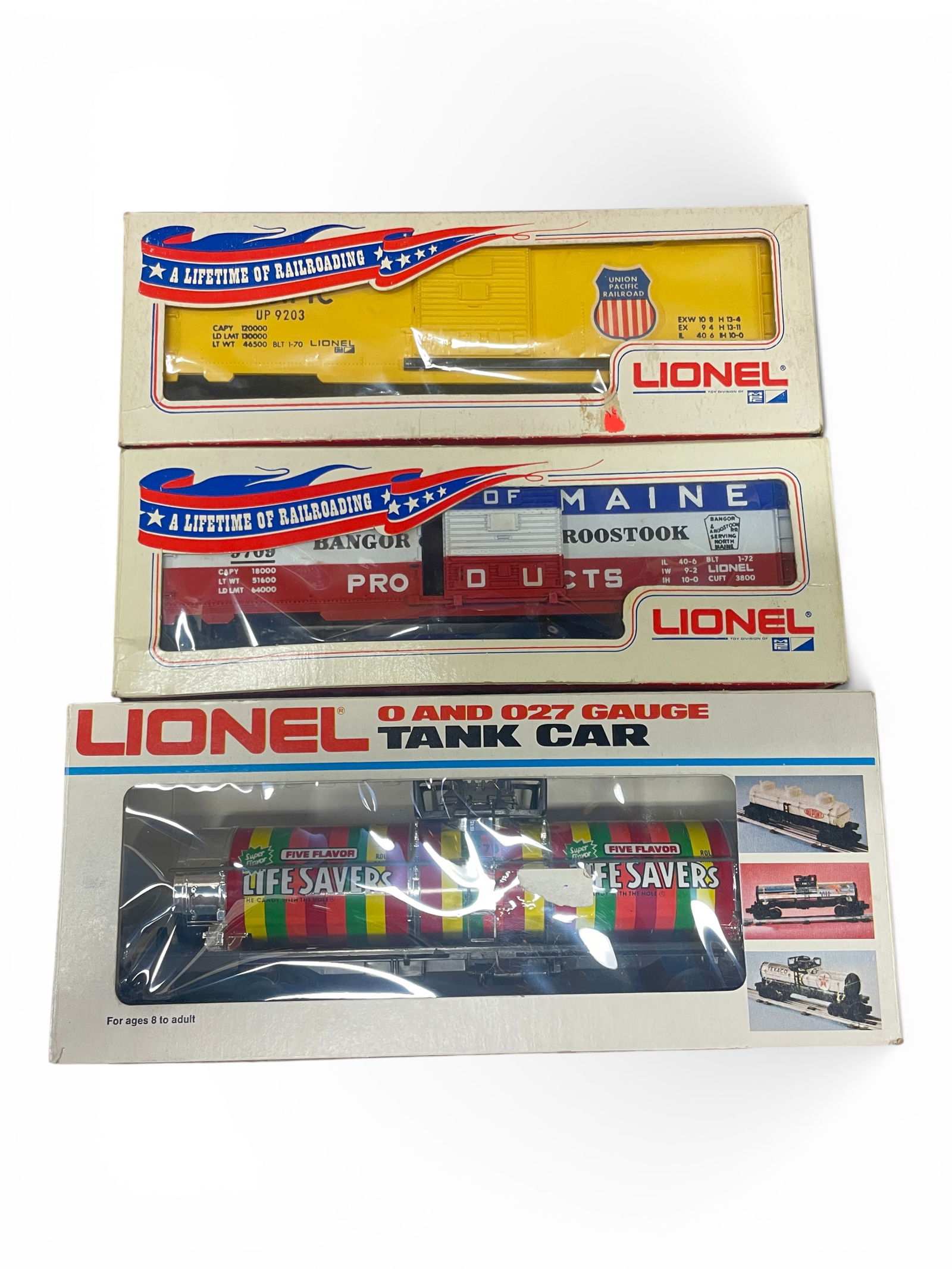 3 Harder Lionel MPC Freights: Includes a 9203 UP BOX, Painted on yellow mold; 9709 SOM, both in banner boxes; 9276 Lifesavers Tank. All are unrun in better than average boxes.Shipping: Weiss Auctions offers full-service, in-house