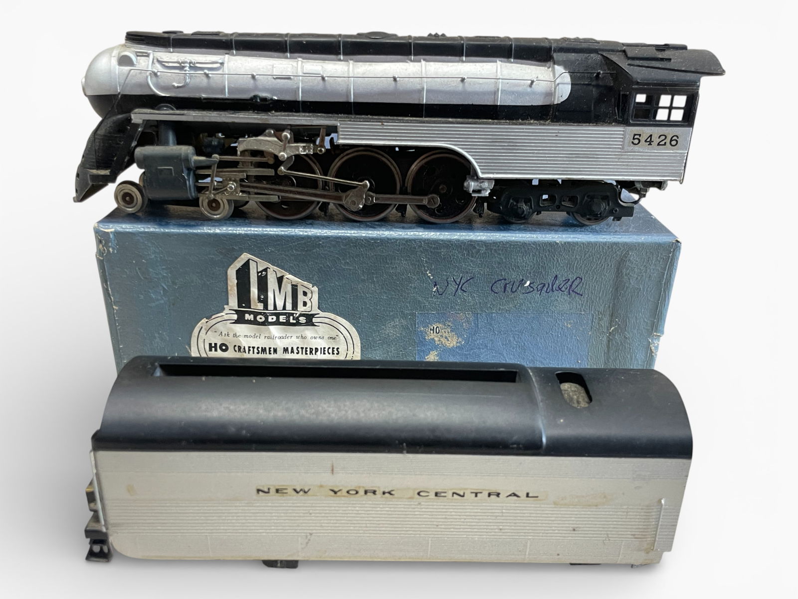 LMB Brass HO NYC Crusader: HO Gauge. It looks factory painted, custom decaled Streamline 4-6-4 Hudson. #5426. Would benefit from a cleaning and shows light run time with box, 1/2 label left, no foam. Shipping: Weiss Auctions of