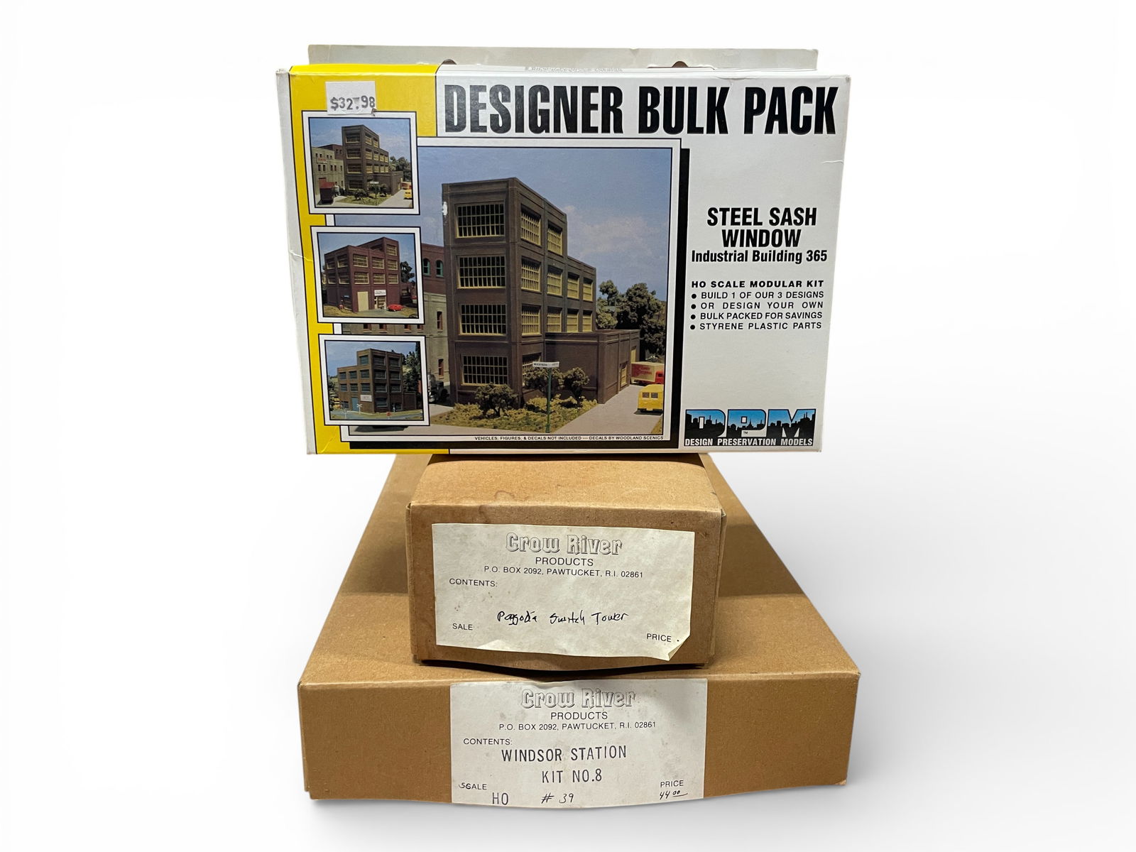 3 Laser Cut HO Structure Kits: HO Gauge. Includes a DPM Industrial Building; Crow River Paggota Switch Tower Kit; Grow River Windsor Station Kit. The appear unbuilt and intact with boxes, Not collated for completeness. Shipping: We