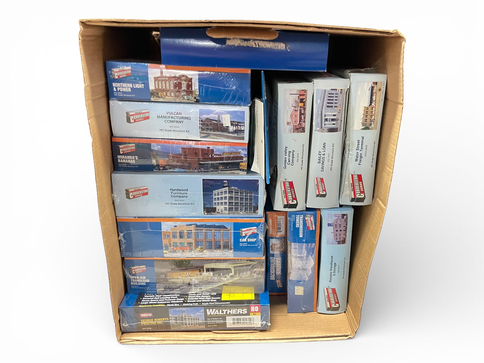 16 Walthers Cornerstone Structure Kits: HO Gauge. Most are sealed and there are several Large industrial Buildings included, 2 in peg bags. Examine photos for exact lot contents. Shipping: Weiss Auctions offers full-service, in-house shippi