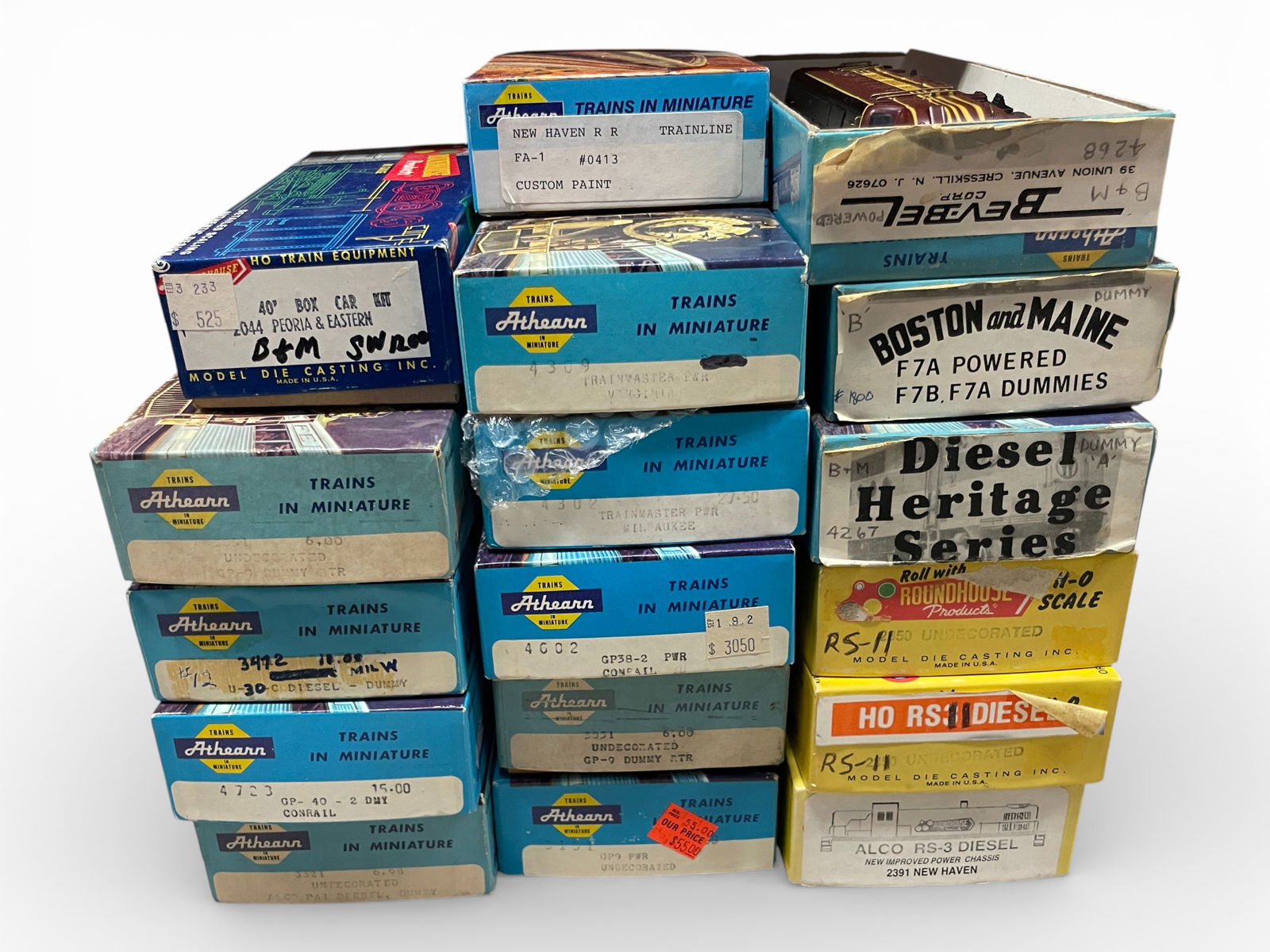 17pc HO Diesel Locomotive Lot: HO Gauge. Includes an Athearn B&M F7 ABA; 2-Roundhouse RS11s, Undec; RS3 NH Diesel; Athearn GP9 AA undec; Conrail GP38-2; Milwaukee & Virginian Trainmaster FMs NH FA1 custom paint; Roundhouse B&M