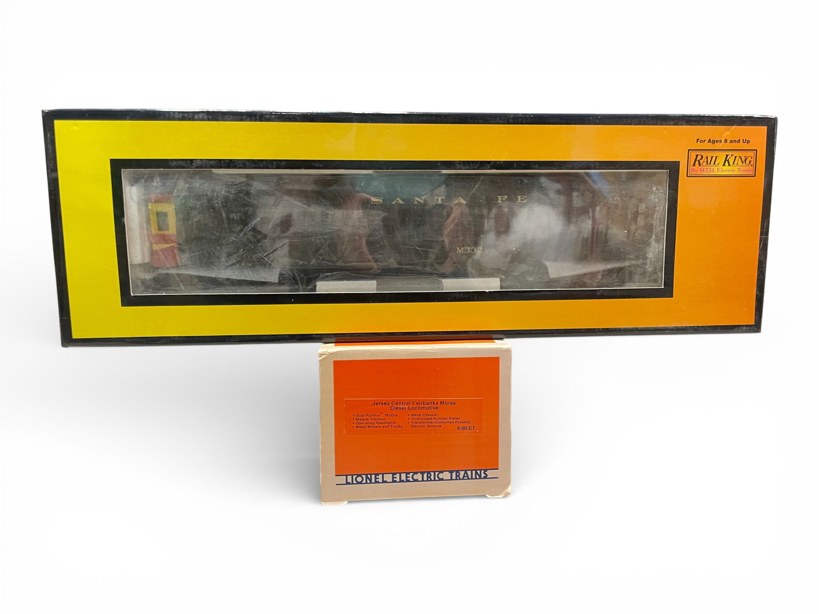 Lionel FM,. MTH Doodlebug Trailer: Includes a Lionel 8687 JC FM diesel; MTH 30-2135-3 SF Non-Powered Doodlebug. They appear new in boxes. Shipping: Weiss Auctions offers full-service, in-house shipping for nearly all items in this auct