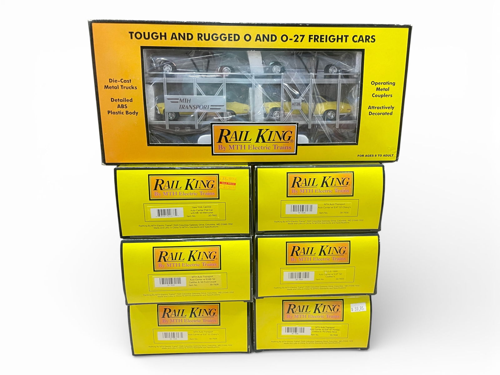 7 MTH RailKing 4-Car Auto-Loaders: Includes 30-7656, 30-7628, 30-7682, 30-7694, 30-7638, 30-7659, 30-7656. All appear new in boxes.Shipping: Weiss Auctions offers full-service, in-house shipping for nearly all items in this auction.