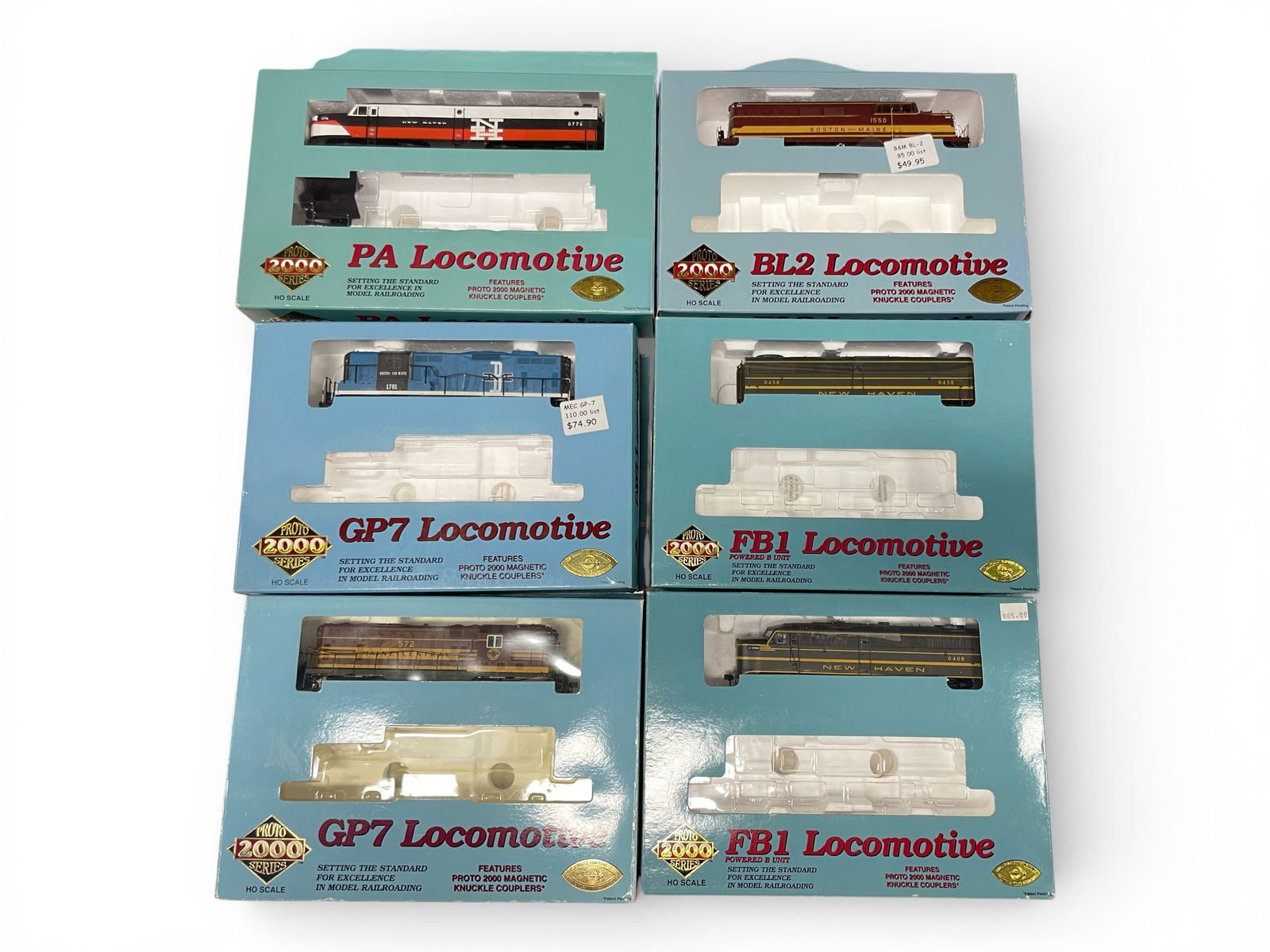 6 Proto 2000 Diesels: HO Gauge. Includes 23010 RDG GP7 Phase II; 30196 B&M BL2 #1550; 21683 NH PA #0775; 23586 MEC GP7 #572; NH FB1 AB Diesels, both powered #0408 & 0458. All show light use with boxes.Shipping: Weiss