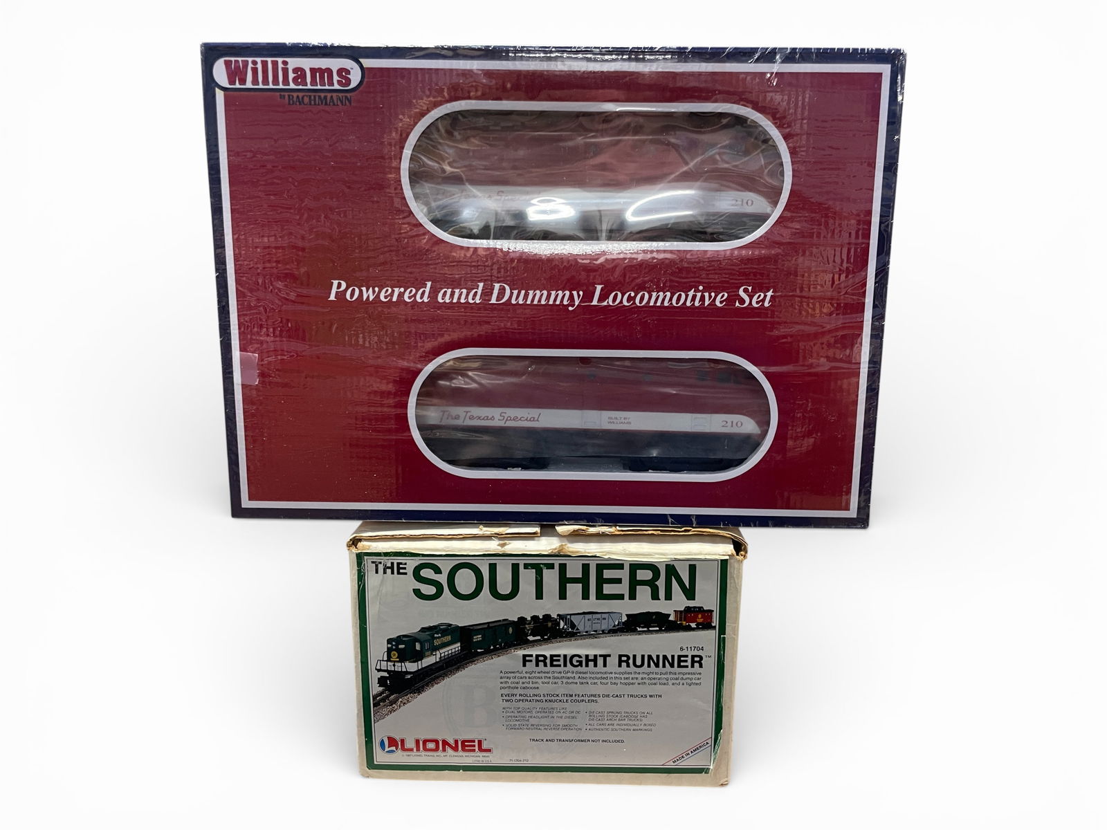 Williams TS FA2; Lionel Southern Set: Includes a Williams 20091 Texas Special FA2 AA Diesels with True Blast II, sealed in set box; Lionel 11404 Southern Freight Runner set, GP9 with 5 Freights, like new with boxes and set box. Shipping: