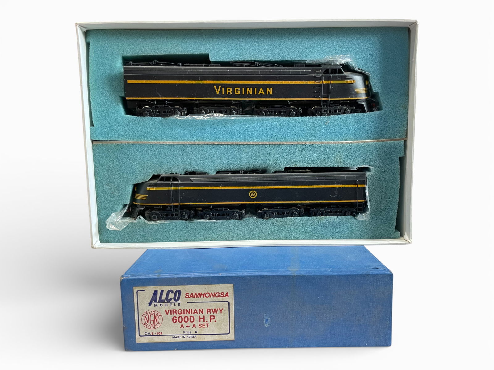 Alco Brass HO Virginian E-104 AA Electric: HO Gauge. Nice custom painted and decaled 4-4 + 4-4 AA Electrics. Both are all wheel drive with open frame motors. They would benefit from a light cleaning and shows light play wear with nice set