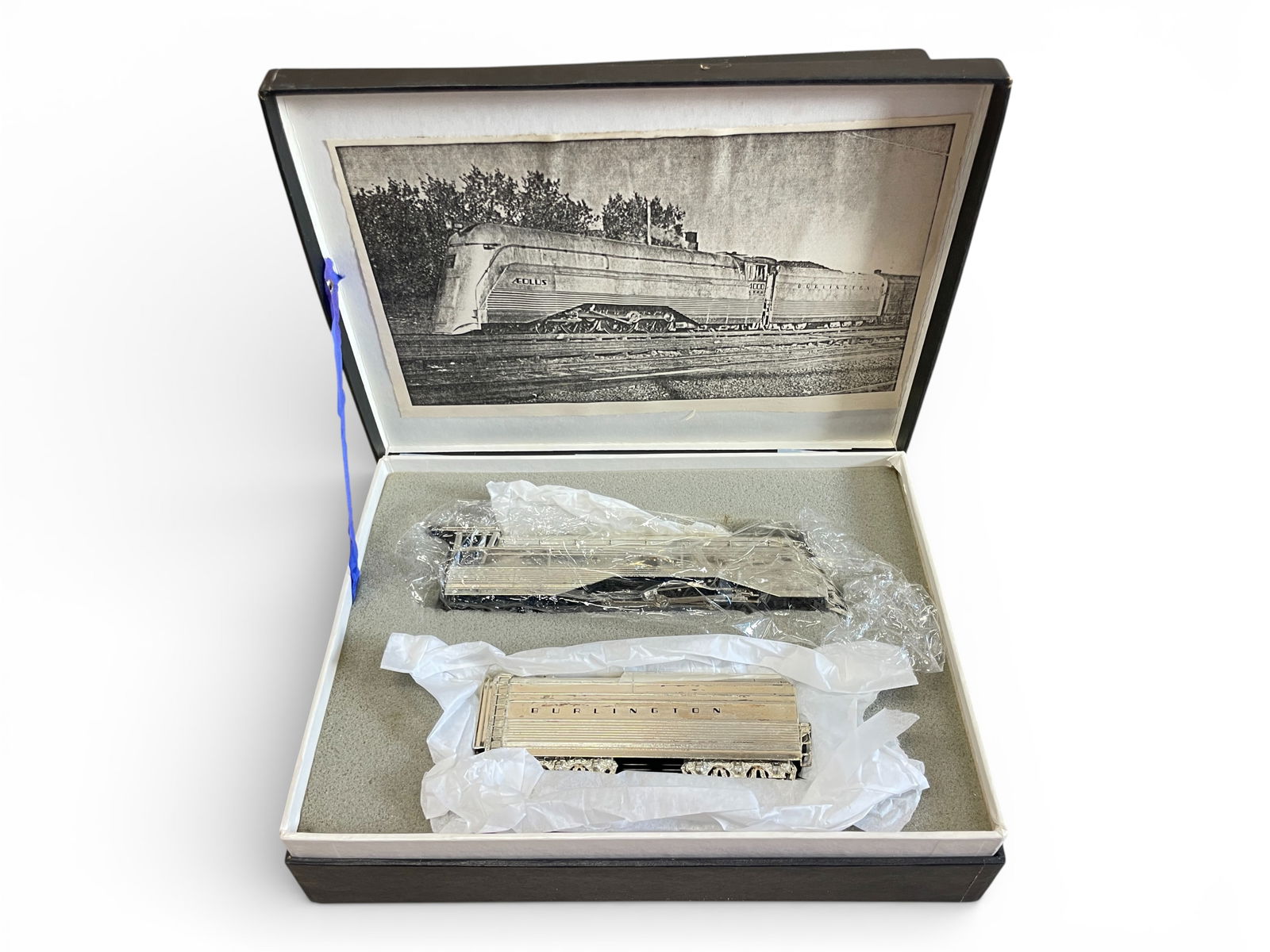 NJCB Brass HO Burlington S-4A Crusader: HO Gauge. Factory finished brass Streamline Hudson with custom decals, #4000. Nice detailed cab interior with headlight lens, only, can motor. Some tarnishing to finish, some decal movement, probably